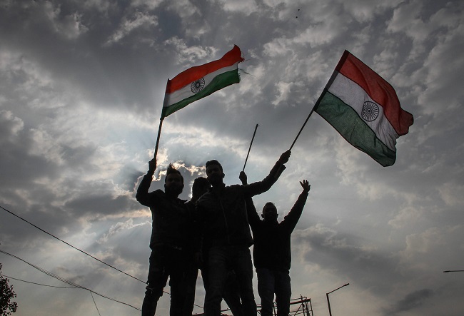 Protesters holding Tricolor raise slogans during a demonstration against the Pulwama terror attack in which 40 CRPF personnel were martyred. The Pulwama terror attack is the deadliest suicide attack in Kashmir where a Jaish-e-Mohammad suicide bomber rammed his car, packed with around 250 kilogram explosives, into a CRPF convoy at Pulwama in South Kashmir on February 14, 2019. (Photo: PTI)