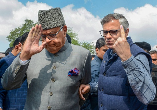 National Conference President Farooq Abdullah with his son and former Chief Minister of Jammu & Kashmir, Omar Abdullah. (Photo: PTI)