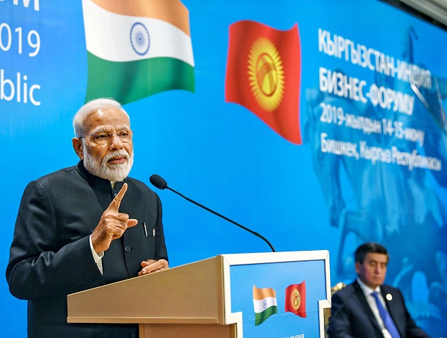 Indian Prime Minister Narendra Modi addresses the joint inauguration of India-Kyrgyz Business Forum at Bishkek, Kyrgyz Republic on Friday, June 14, 2019. Modi was in Kyrgyz capital to attend the Shanghai Cooperation Organisation (SCO) Summit. India and Pakistan are two members in the 8 member economic and security bloc of SCO group. Modi merely exchanged pleasantries with Imran Khan but refused a dialogue with Pak PM. (Photo: PTI)