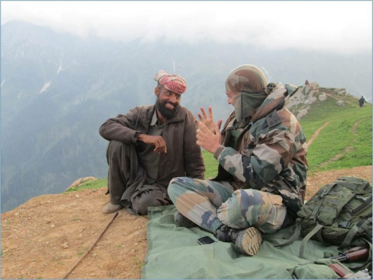 An Indian Army soldier of the Northern Command shares a lighter moment with a civilian. (Representative photo)