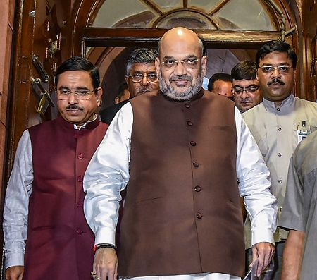 India's Home Minister Amit Shah along with Parliamentary Affairs Minister Prahlad Joshi and other leaders after the passage of J&K Reorganisation Bill by the Rajya Sabha on Monday August 5, 2019. (Photo: PTI)