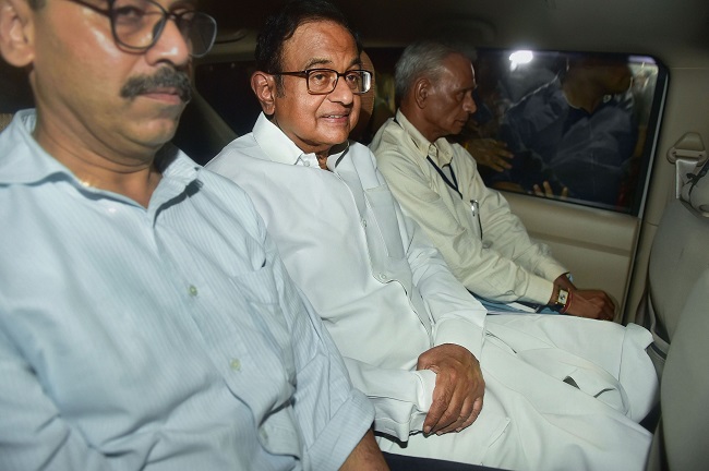 Central Bureau of Investigation (CBI) officials arrest Congress leader P Chidambaram (centre) from his Jor Bagh residence in New Delhi on Wednesday, August 21, 2019. The Delhi High Court on Tuesday had refused to grant any protection from arrest to Chidambaram in his alleged role in the INX media case. (Photo:PTI)