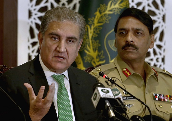 Pakistan's Foreign Minister Shah Mahmood Qureshi (left) along with Maj. Gen. Asif Ghafoor (right) during a press conference in Islamabad, Pakistan, on Saturday August 17, 2019. Asif Ghafoor is DG ISPR (Director General Inter-Services Public Relations) of the Pakistan Army which spearheads all propaganda drives by Pak Army. (Photo: AP/PTI)