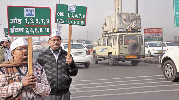 Aam Aadmi Party (AAP) volunteers holding placards about the odd-even scheme for vehicles in Delhi. (File Photo)