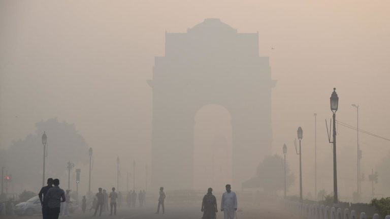 India Gate covered in a heavy smog blanket. (File Photo/AFP)