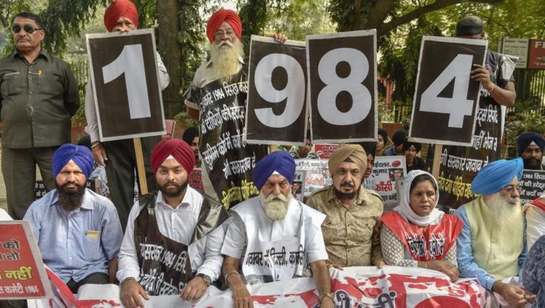 Victims and family members of 1984 Sikh riots sitting on a protest at Jantar Mantar, New Delhi. (Photo: PTI)