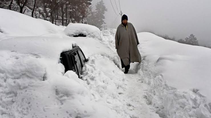 A man wades through heavy snowfall in Kashmir Valley. (File Photo: AP)