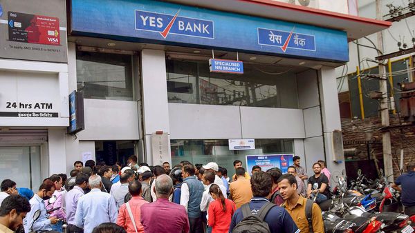 Anxious depositors outside a Yes Bank branch. (Photo: PTI)