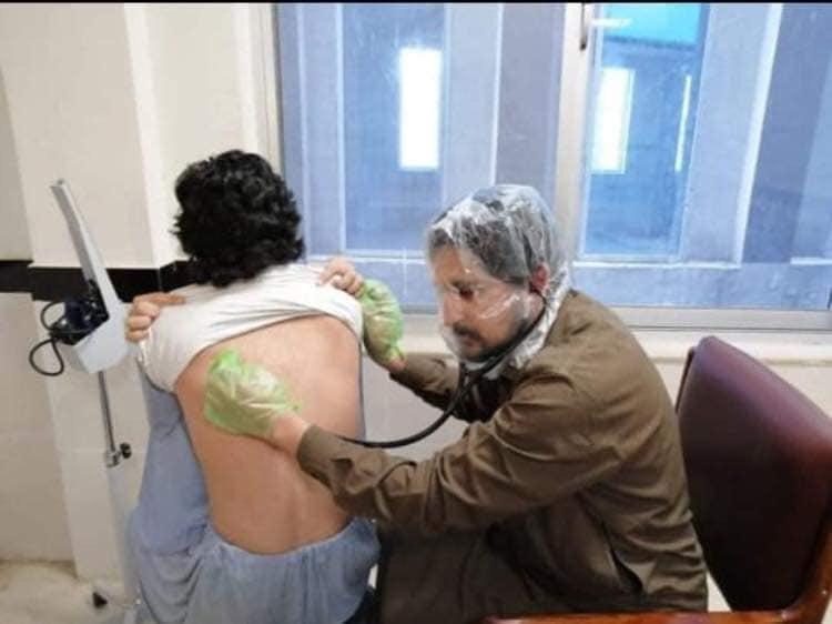 A doctor in Balochistan is forced to wear crude polythene masks while treating patients in the absence of PPE (personal protective equipment). (Photo: News Intervention)