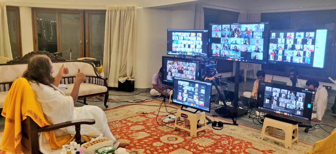 Sri Sri Ravi Shankar during a meditation session. Sri Sri's devotees are spread across the world who connect through video conferencing apps with their Guru.