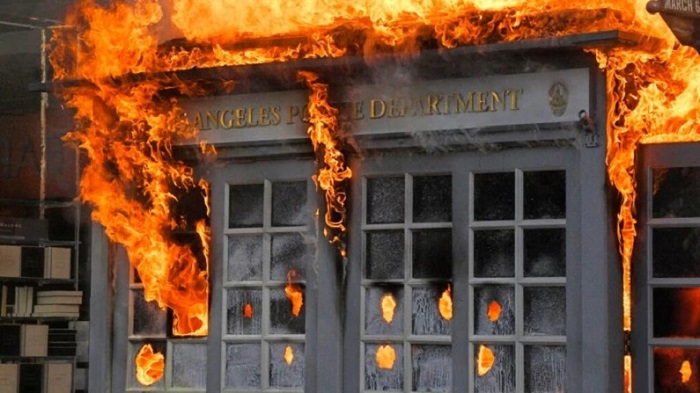 Los Angeles Police Department kiosk set on fire by rioters who were protesting the death of George Floyd on May 30, 2020. (Photo: AP)