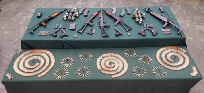 Arms cache recovered by the Indian Army from the terrorist hideout near LOC in Baramulla. (Photo: News Intervention)