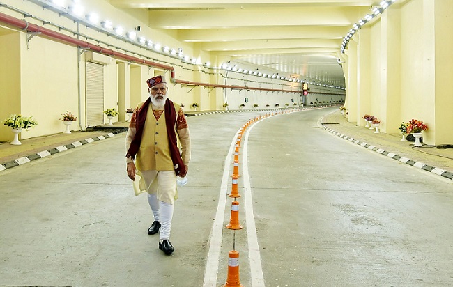 Prime Minister Narendra Modi walks inside the Atal Tunnel soon after its inauguration on October 3, 2020. Atal Tunnel is world's longest highway tunnel that reduces surface travel time to Ladakh. (Photo: PIB)