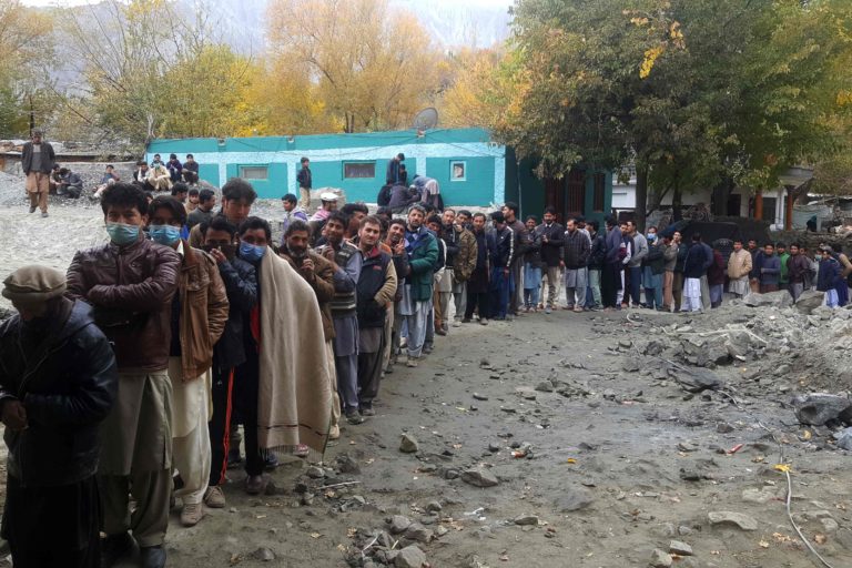 People queue to cast their ballot at a polling station during the legislative assembly election at Skardu city in Gilgit-Baltistan on November 15, 2020. (Photo: AFP)