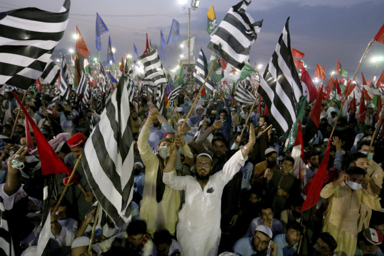 (File)Supporters of the Pakistan Democratic Movement take part in an anti government rally in Karachi, Pakistan, Sunday, Oct. 18, 2020. Protests took place in a campaign against Prime Minister Imran Khan to force him step down over what they say is his failure in handling the nation's ailing economy. (AP)