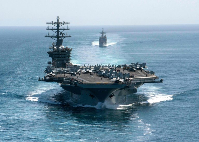 Aircraft carrier USS Nimitz and the guided-missile cruiser USS Philippine Sea in formation during a Strait of Hormuz transit. US President Joe Biden's administration pulled the USS Nimitz carrier strike group out of the Gulf in a sign of potentially easing tensions with Iran, which had soared under former president Donald Trump. Pentagon spokesman John Kirby said on February 2, 2021, that the Nimitz group had sailed from US military's Central Command in the Middle East to the Indo-Pacific Command region. Kirby, however, did not confirm reports that the Nimitz was headed back to the US after some nine months at sea. (Photo: US NAVY/ AFP) 