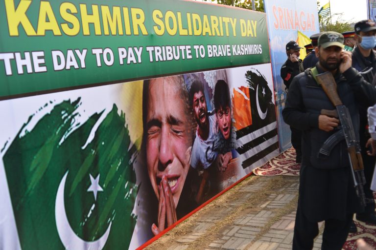 Security personnel stand guard during a rally to mark Kashmir Solidarity Day in front of the parliament in Islamabad on February 5, 2021. (Photo: AFP)