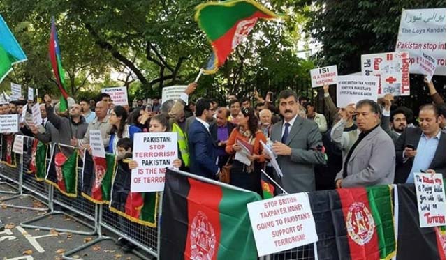 Hundreds of Afghans staged a peaceful demonstration in front of Pakistan High Commission in London against Pakistan’s interference in Afghanistan. (Photo: PTI)